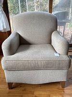 Front view of the armchair showing full silhouette
