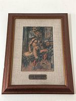 Full view of framed artwork showing wood frame, linen mat and painting