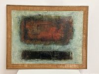 Full front view of the framed abstract painting