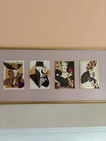 Framed piece showing four individual hand painted cards with varied abstract and figurative imagery in warm and neutral tones on pink mat background. Whole set professionally framed with gold frame.