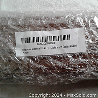 Close-up of label on bubble wrap packaging of bergamot incense sticks, showing the text describing the item as 'Bergamot Incense Sticks (1... Sticks Hand Sorted Packet) New'.