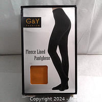 Boxed black fleece lined pantyhose with product branding showing black color and fleece lining visible in packaging window as gold.