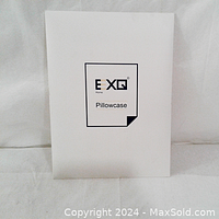 White packaging with EXQ Home Pillowcase label