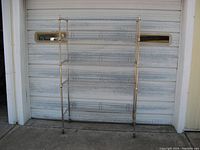 Front view of the NSF five-shelf wire rack with wheels.