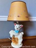 Full view of vintage ceramic lamb lamp base and lampshade with Mary Had A Little Lamb lyrics