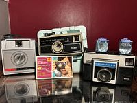 Three vintage Kodak cameras with original box for Hawkeye Instamatic II