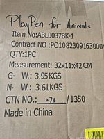 Cardboard packaging label showing item number, weight, and dimensions with 'Made in China' marking.
