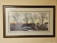 Front view of the framed winter print showing the artwork and frame condition.