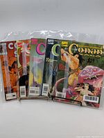 Lot includes 5 Marvel Conan The Barbarian comics, faces shown in a fan arrangement inside protective plastic sleeves.