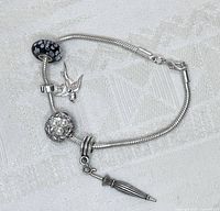 Silver-tone Pandora-style charm bracelet laid flat showing all charms and clasp.
