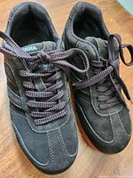 Top view of the pair of dark brown Terra women's sports shoes showing laces and upper material.