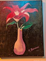 Front view of the original painting showing the red flower in a pink vase with signature R. Burnham and dark background.
