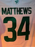 Back of jersey showing sewn vinyl name 'MATTHEWS' and number '34'