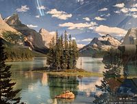 Close-up of the photo artwork showing the scenic island, lake, and mountain range