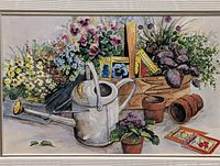 Photo of framed 8x10 print depicting flowers, watering can, and gardening items.