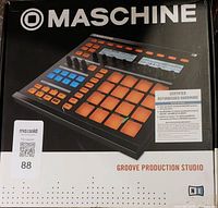 Original box for Native Instruments Maschine Mk1 groove production studio controller, showing product image and certification of refurbished hardware.