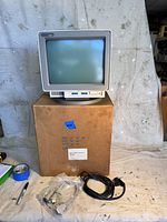 IBM 3486 InfoWindow II CRT monitor with cables and box in background