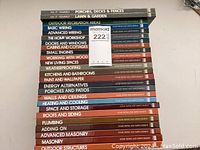 Stack of 25 Time-Life Home Repair & Improvement books showing titles and colorful spines.