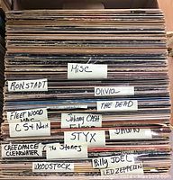 Front view of record spines with handwritten divider labels: Misc, Ronstadt, Olivia, The Dead, Fleetwood Mac, CS&N, Johnny Cash, Styx, Creedence Clearwater, The Stones, Woodstock, Billy Joel, Led Zeppelin