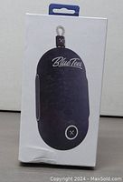 Front side of the sealed product box showing Blue Tees branding and speaker image.