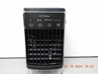 Front view of the black portable air cooler cooling fan showing control panel, air vents, and timers.
