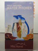 Photo of boxed MiscHome Fruit Infuser Water Pitcher showing the product name and image of pitcher with fruit inside.