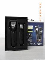 Photo of the two YiLFo grooming devices in black with packaging box showing product details and model numbers JM-568 and JM-751.