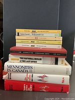 Stack of Canadian history books showing titles and authors for identification