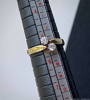 Ring on sizing stick showing size 5.5