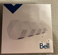 White box with image of five Bell WiFi nodes arranged in perspective view and Bell logo in bottom right corner