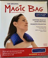 Boxed Magic Bag thermotherapeutic pack shown draped on neck, packaging highlighting uses for soothing aches and pains, and promoting relaxation.