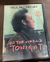 Front cover of Paul McCartney DVD titled 'In The World Tonight' showing Paul McCartney profile and title text.