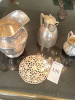 Overhead display of all four items on black surface