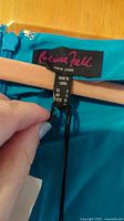 Label inside the dress showing brand Patricia Field, size US 6, made in China.