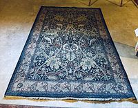 Full length of the carpet showing overall condition and pattern detail