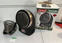 Two Coleman propane heaters, one ProCat Infrared Heater with original box and one smaller portable heater