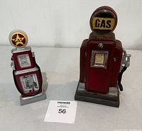 Front view of two gas pump themed items, a bank and a picture frame, showing details and scale.