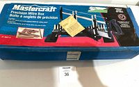 Photo showing the full Mastercraft Precision Mitre Box kit in original sealed box, with colored product images and description.