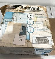 Box of ShelterLogic AutoVent Shelter Ventilation Kit showing product name and features including temperature-based automatic vent opening and closing.