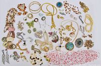 Overview of all costume jewellery items showing variety and condition