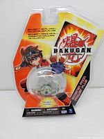 Front image of the sealed Bakugan Battle Brawlers Series 1 booster pack with character illustration and visible Bakugan orb