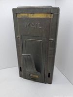 Front view showing embossed “MAIL” text and front flap closed