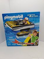 Front view of sealed Playmobil Sports & Action Click Rider box showing set contents and age recommendation of 6-10 years.