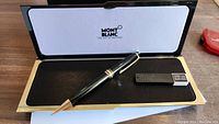 Open Montblanc gift box showing mechanical pencil and additional lead pack