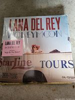 Photo showing sealed Lana Del Rey Honeymoon vinyl record with promotional sticker.