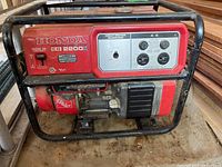 Front view showing control panel with circuit breaker, dual 120V 15A outlets and 12V DC outlet