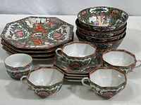 Group shot showing all plates, bowls, cups and saucers