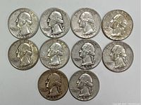 Obverse of 10 Washington quarters from 1940 to 1962, showing George Washington profile and date stamps.