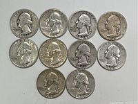 Obverse sides of 10 US Washington Quarters from dates including 1936, 1954, 1953, 1961, and 1942, showing portrait of George Washington.