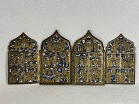 Full view of four-panel folding icon on white background